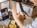 Online Team Building Cooking Class - Bagel Workshop: person slicing lemons in an online cooking class