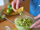 Team Building Cooking Class - Guacamole Mashup Competition: person tasting homemade guacamole
