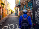 Food Tour - Exploring the Mission District in San Francisco: person walking on a food tour in san francisco's mission district