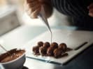 Cooking Class - Chocolatier Foundations: piping chocolate over truffles