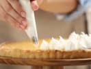 Cooking Class - Iconic Pies From Scratch: Gluten-Free & Dairy-Free in Boston Proper: piping meringue on lemon pie