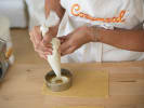 Cooking Class - Crafting Perfect Pasta: piping ricotta filling to ravioli