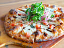 Team Building Cooking Class - Scratch Pizza Competition in Austin: pizza with vegetables and cheese