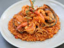 Team Building Cooking Class - Unforgettable Spanish Feast in Toronto: plated seafood paella dish