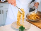 Cooking Class - From-Scratch Pasta Feast in Downtown Chicago: plating  Fettuccine Pasta Bolognese