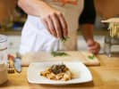 Cooking Class - Traditional Pasta-Making in Downtown Chicago: plating fresh pasta with meat and garnish