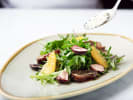 Cooking Class - The Best of New American Cuisine: plating green salad with arugula toasted almonds blue cheese