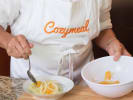Team Building Cooking Class - Spanish Flavor Extravanganza in DC: plating orange and fennel salad with Cozymeal apron on
