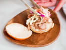 Cooking Class - Americana Recipes in Downtown Dallas: plating pulled pork sandwich