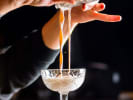 Online Mixology Class - Spooky Craft Cocktails: pouring a halloween cocktail