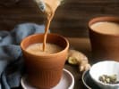 Cooking Class - Delicious Diwali Fare in East Bay: pouring chai tea into a cup