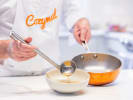 Cooking Class - Crafting the Flavors of Asia: pouring dumpling soup