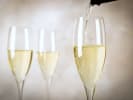 Online Mixology Class - Sensational Sips for Swifties: pouring glasses of prosecco