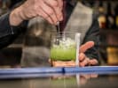 Online Mixology Class - Spirits of Ireland: pouring whiskey over ice