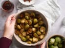 Cooking Class - The Perfect Dinner Party - Date Night in Dallas: preparing roasted brussels sprouts in a pot