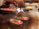 Private Chef - Gourmet Hibachi Fare: Hibachi chef cooking meat