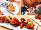 Private Food Tour - A Culinary Adventure in Vancouver: private vancouver tour   enjoying wings and poutine