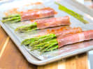 Cooking Class - Flatbread-Style Pizza: prosciutto wrapped asparagus on a tray