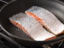 Cooking Class - Italian Seafood in South Bay Los Angeles: searing salmon filets in a pan
