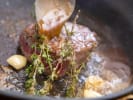 Cooking Class - A Culinary Tour of Tuscany: searing steak with butter and herbs