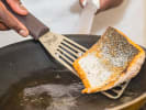 Cooking Class - Cook an Intimate Provençal Dinner - Date Night in San Fernando Valley: searing salmon in a pan