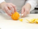 Cooking Class - Elevated Asian Takeout at Home: segmenting an orange