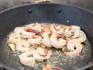 Couples Cooking Class - Southern-Style Brunch Staples: shrimps being sauteed in a pan