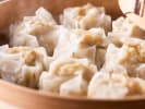Cooking Class - Perfectly Pleated Dumplings: shumai dumplings in a steamer