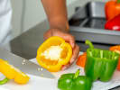 Team Building Cooking Class - Italian-American Favorites: slicing bell peppers