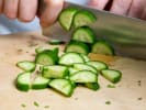 Cooking Class - Gourmet First Class Fare: slicing cucumber