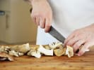 Cooking Class - Roman Trattoria Menu: slicing mushrooms