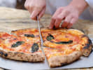 Cooking Class - Classic Italian Pizza Extravaganza: slicing pizza