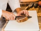 Cooking Class - Sustainable Seafood and More: slicing seared tuna