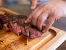 Cooking Class - Tuscan Farmhouse Cuisine: slicing steak