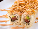 Cooking Class - Make Epic Sushi Rolls at a Local Brewery and Taproom in Boston Proper: spicy tuna sushi roll with a drizzle of sauce