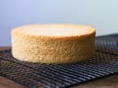 Online Cooking Class - Elegant Roll Cake: sponge cake base out on a cooling tay