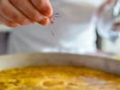 Online Cooking Class - Perfect Paella and Crema Catalana: sprinkling saffron into paella