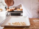 Cooking Class - Craft Fresh Pasta Three Ways in Manhattan: sprinkling fresh Orecchiette pasta with flour