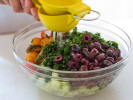 Cooking Class - Nourishing Mediterranean Meals in East Bay: squeezing lemon over salad