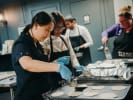 Team Building Cooking Class - Mexican Fiesta Dinner Team Building in Boston in Boston Proper: team building participants cooking tortillas