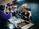 Team Building Cooking Class - Mexican Fiesta Dinner Team Building in Manhattan: team building participants preparing Mexican menu