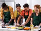 Team Building Cooking Class - From Tempura to Sushi: Japanese Favorites in DC: team preparing sushi rolls together