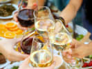 Virtual Wine Tasting - Festive European Winter Wonderland Wine: team tasting wine at a team building event