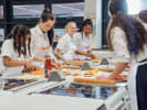 Cooking Class - 5-Day Foodie Fun Teens: Core Techniques Essentials in Northern Virginia: teenages during a cooking class