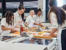 Cooking Class - Advanced Recipes: Teen Summer Series in Northern Suburbs: a group of teenage girls are attending a cooking lesson
