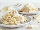 Cooking Class - Make Ravioli & Tagliatelle at a Wine Bar in Minneapolis: two plates of cacio e pepe pasta with generous amount of Parmesan cheese