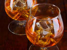 Online Mixology Class - Whiskey From Around the World: two sifters of whiskey with ice