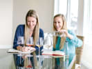 Virtual Wine Tasting - Small-Batch Premium Canned Wines: two women enjoying a wine tasting