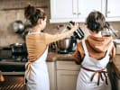 Cooking Class - 4-Day Foodie Fun Teens: Level Up Your Flavor Skills in Houston: two teens whisking batter