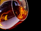 Online Mixology Class - Whiskey From Around the World: whiskey in a sifter on its side